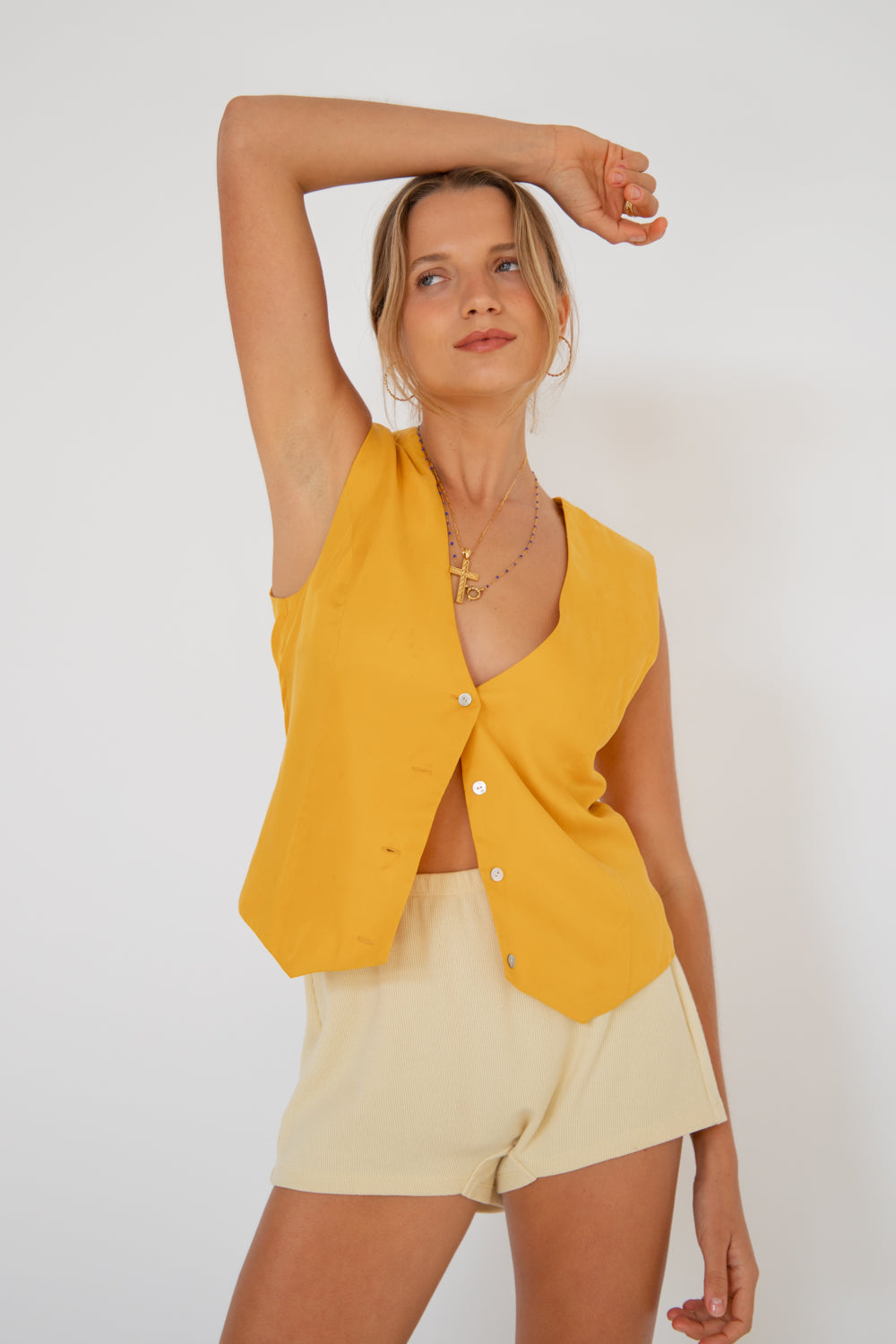 Yellow going store out tops